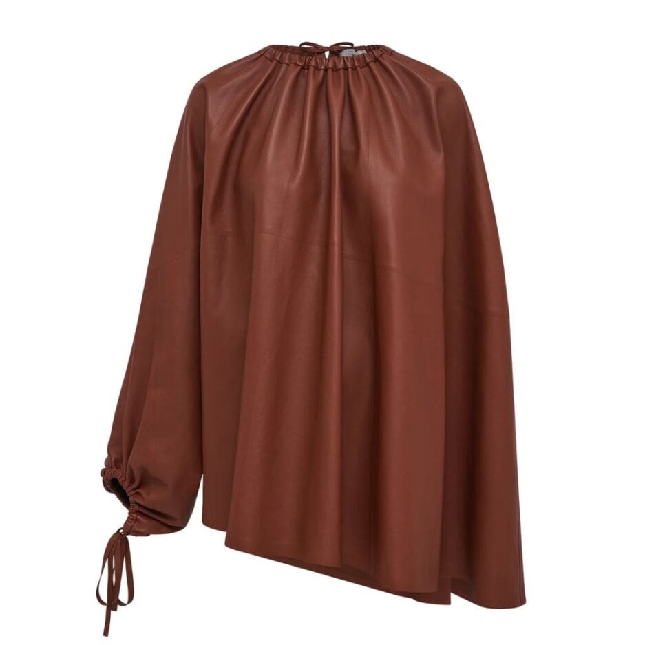 Slipover style women faux leather cap top
